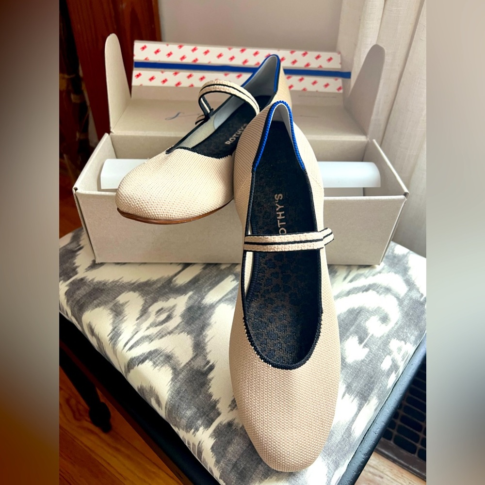 Tan (Ecru) Rothy’s Mary Jane flats.